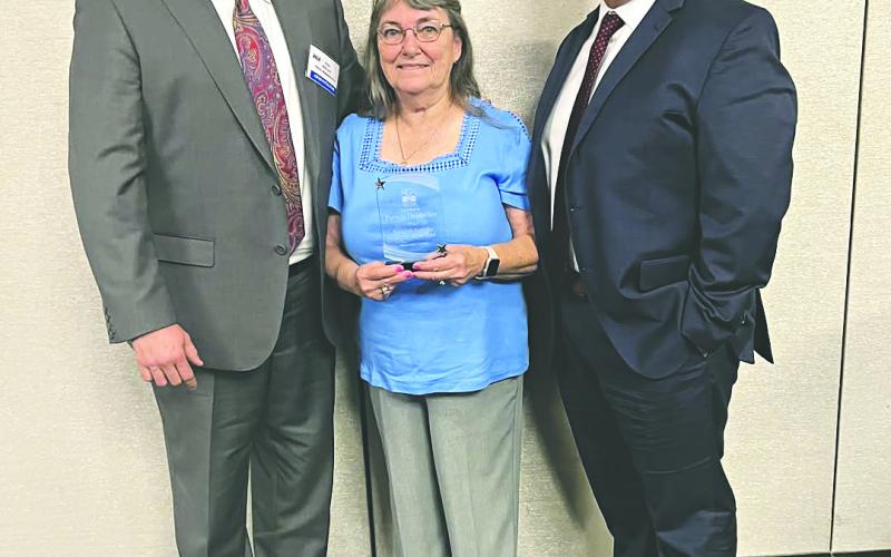 Patricia Duplechin, Activity Director of Heritage Manor of Ville Platte (center), was named the 2025 Resident Activity Director of the Year by the Louisiana Nursing Home Association (LNHA) at the Fall Conference in New Orleans. She is shown with Eddie Borland, Pathway Management of Louisiana (left), and Trey Prudhomme, Administrator of Heritage Manor. (Photo courtesy of Heritage Manor)