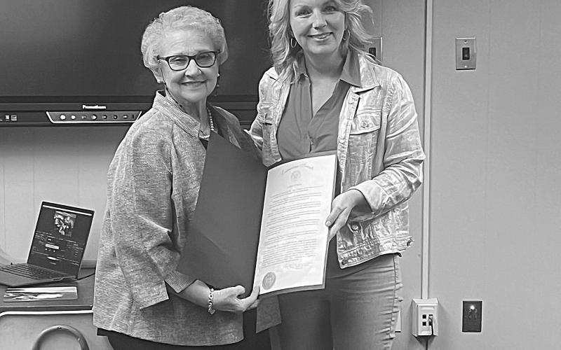 State Senator Heather Cloud (right) presents a state resolution to former Evangeline Parish School Board member, Peggy Forman (left). (Gazette photo by Tony Marks)