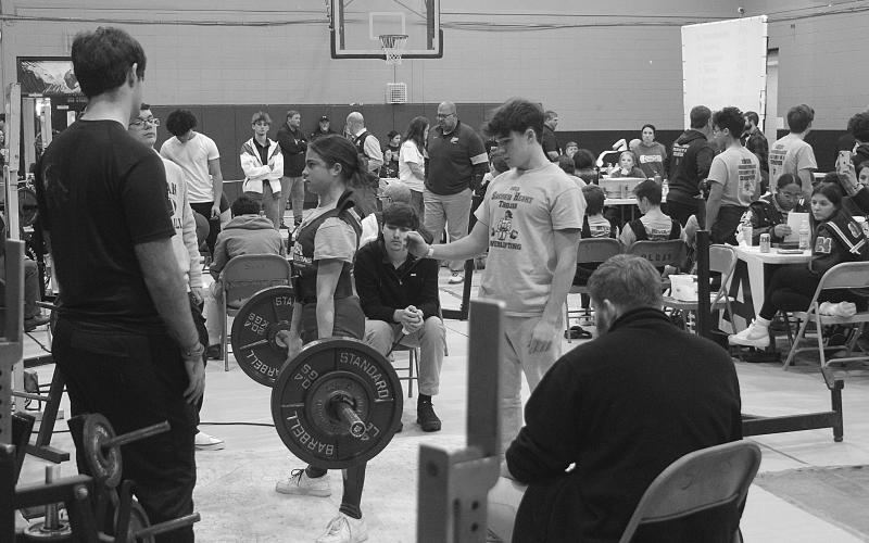 Adeline Launey, of Sacred Heart High School, dead lifts in the Sacred Heart Invitational. Her best mark in the event was 280 pounds, and her total mark on the day in all three events was 620 pounds. (Gazette photo by Tony Marks)