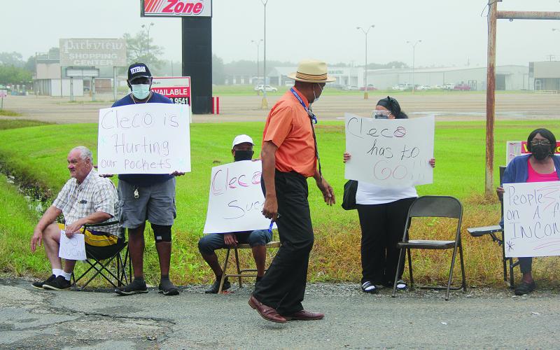 City Councilman Anderson (center) meets with several of the protestors on Wednesday, September 29. Future events are also planned. (Gazette photo by Tony Marks)