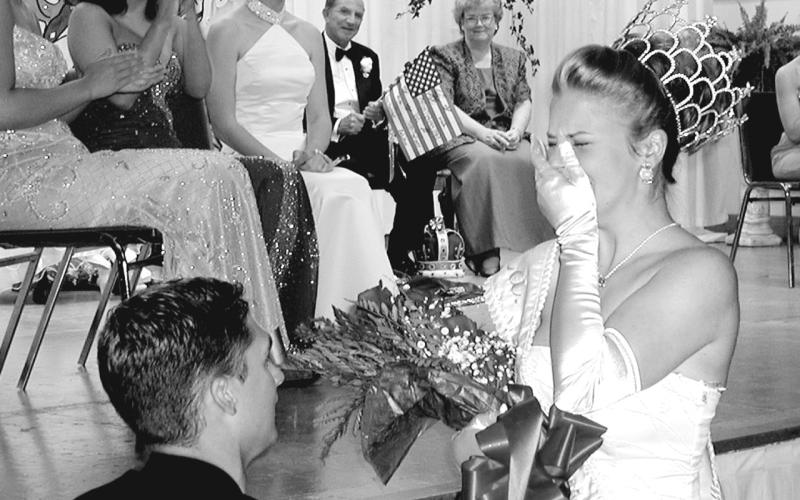 A SPECIAL COTTON QUEEN MOMENT - As she said farewell to her reign as Queen Cotton XLVII, Theresa Martin was surprised by her boyfriend, Dwayne Jenkins, who got down on one knee and asked her to be his queen forever. The teary-eyed beauty said yes to thunderous cheers from the crowd. (Gazette file photo)