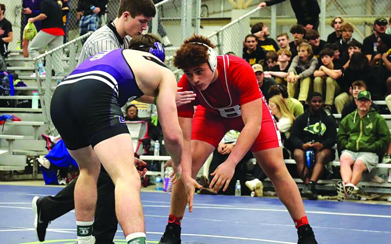 Bearcat Romyn Cortez (right) takes on Aidan Angrisano from Dutchtown in the finals at the La. Public Schools State Championships.