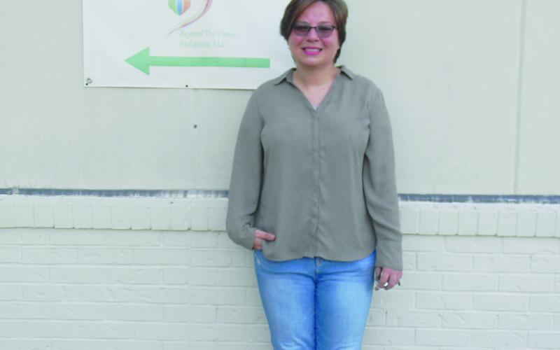 Raylynn Pommier is pictured outside her Beyond the Curve Pediatrics clinic in Mamou. Pommier and her husband are board certified behavioral analysts and are planning a Disabilities Awareness Walk on Oct. 16 in Mamou. (Gazette photo by Heather Bogard)