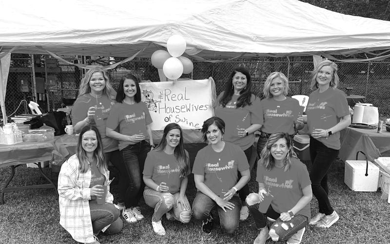 The Real Housewives of Swine capture the grand championship in the Pork Cook-Off.