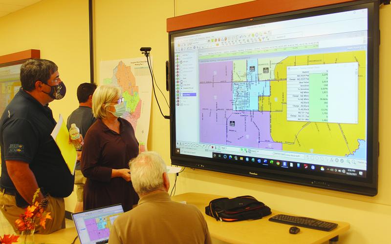 Also holding a public hearing on reapportionment this past Tuesday was the Evangeline Parish School Board. From left are board members Mike Fontenot and Karen Vidrine. Also pictured, with his back turned, is demographer Mike Hefner. (Gazette photo by Tony Marks)