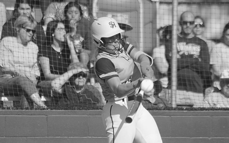 Jolie Vidrine (25) connects with a pitch in Sacred Heart’s playoff opening win against Covenant Christian. (Gazette photo by Rhett Manuel)