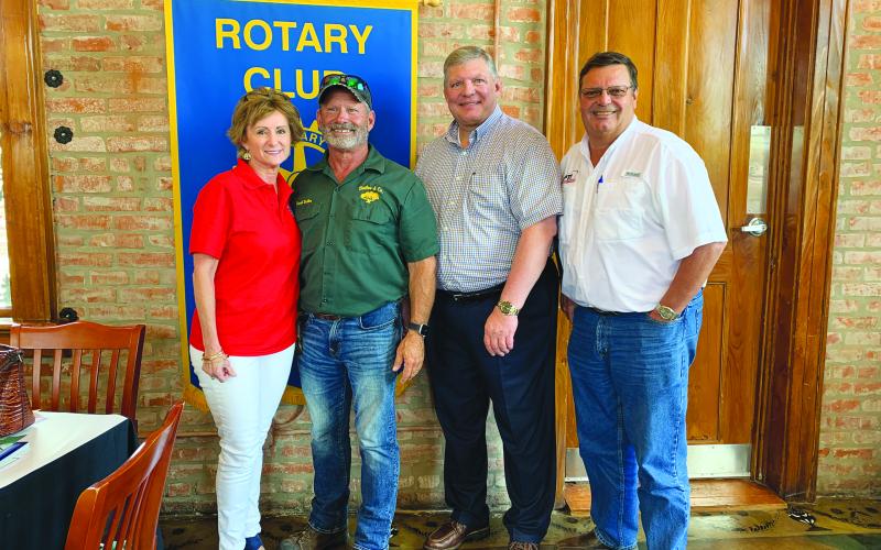 BUTLERS VISIT ROTARY -  Representative Rhonda Butler, left, was the guest speaker for the June 29, meeting of the Ville Platte Rotary Club. Her husband, Frank Butler, also shared an update on his tree service. They are shown with, third from left, Rotary President Peter Strawitz and Rotarian Mitch Fontenot. (Gazette photo by Heather Bogard)