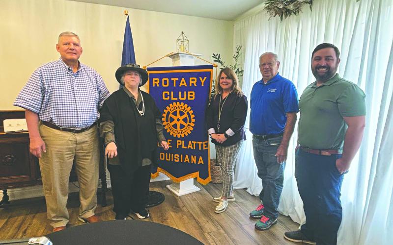 HISTORY OF LOUISIANA ORPHAN TRAIN SHARED - Shown, from left, are Rotarian Peter Strawitz, Laine LaTour, Martha Aubert (president of the Louisiana Orphan Train Museum in Opelousas), museum board member James Douget and Rotary President Beau Wilson. LaTour, Aubert and Douget spoke about their work with and connection to the Louisiana Orphan Train riders that came from New York City to Opelousas. (Gazette photo by Heather Bogard)