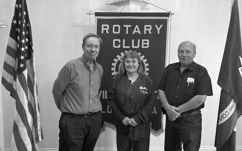 Pictured from left are KVPI General Manager Mark Layne, Heritage Manor Activity Director and Rotarian Pat Duplechin, and Rotary President Bob Manuel. (Gazette photo by Tony Marks)