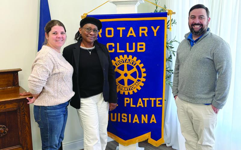 FRENCH IMMERSION DISCUSSED - French Immersion Coordinator Madame Louise Tini (center), gave an update on the program during the Tuesday, November 11, meeting of the Ville Platte Rotary Club. She is shown with Rotarian Kristie Enicke (left) and Rotary President Beau Wilson (right). (Gazette photo by Tony Marks)