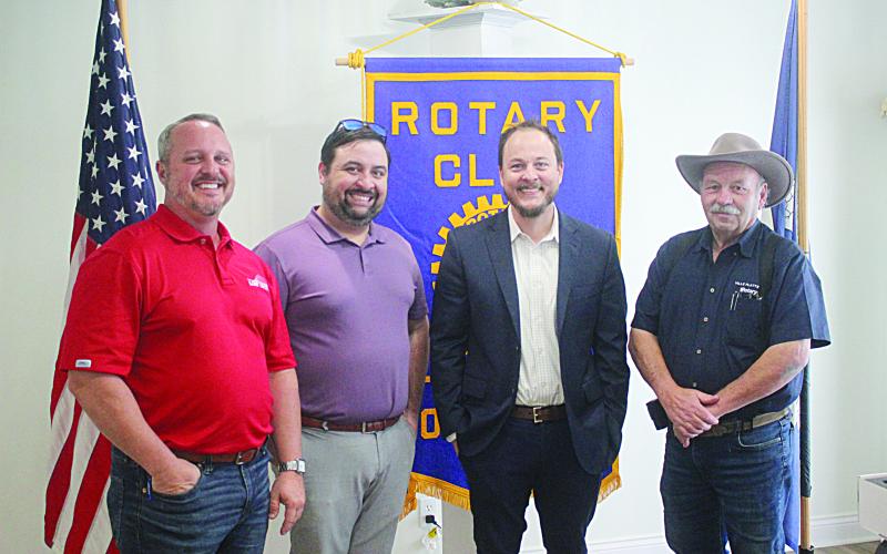 Pictured from left are David Domingue, senior sales representative of LUS Fiber; Rotarian Beau Wilson; Scott Prather, public relations manager of LUS Fiber; and Rotary President Bob Manuel. (Gazette photo by Tony Marks)