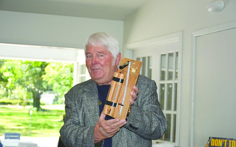John Miller, a native of New York and a retired bomb squad technician, displays an explosive device during the meeting of the Rotary Club of Ville Platte, on Tuesday, May 13. (Photo courtesy of Rotary Club of Ville Platte)