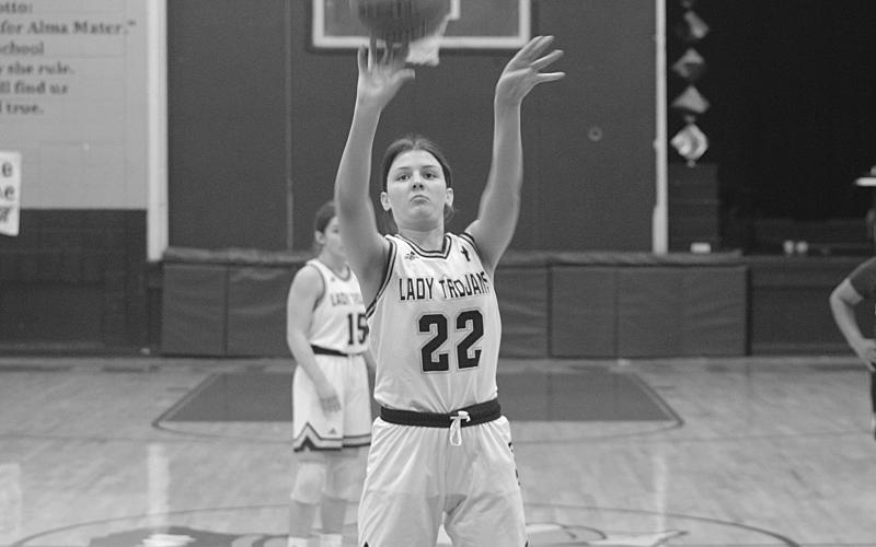 Kali Shiver (22) attempts a free throw for the Sacred Heart Lady Trojans against Lincoln Prep. (Gazette photo by Rhett Manuel)