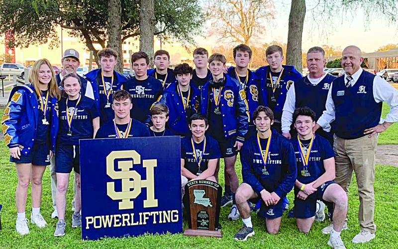 The Sacred Heart Trojan powerlifting team competed at the state championships and returned home as runner-up. Pictured in no particular order are Jackson Manuel, Isiah Rion, Jesse Johnson, Jude Hebert, Hunter Pitre, Michael Fontenot, Colton Manuel, Dylan Doucet, Everette Johnson, Silas Chesne, Madeline Fuselier, Adeline Launey, Lily Deshotel, Abby Quibodeaux, head coach Duane Urbina, assistant coach Robert Soileau, and assistant coach Jacob Reed. Not pictured- statisticians Kristen Ardoin and Carley Cloud
