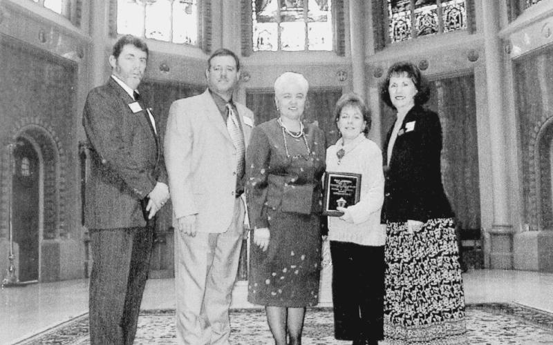 SACRED HEART EDUCATORS AND SUPPORTERS RECOGNIZED - During National Catholic Schools Week in January 2002, Superintendent of Schools Anna Larriviere honored Sacred Heart with several awards. Shown, from left, Curt Saucier with Cabot, which was honored as Catholic School Supporter of the Year; Keith Menard, Sacred Heart High School Teacher of the Year; Larriviere; Paula Landrenea, Diocesan High School Adminstrator of the Year; and Janet Landreneau, Sacred Heart Elementary Teacher of the Year.