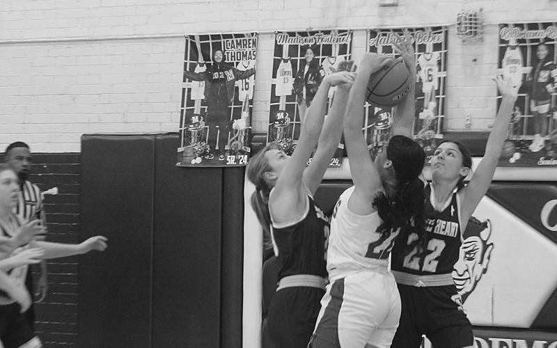 Mamou’s Madison Fontenot (22) attempts a basket against Sacred Heart. (Gazette photo by Rhett Manuel)