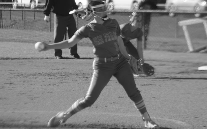 Ava Kordish readies to deliver a pitch in  Pine Prairie’s game at Sacred Heart on Tuesday. (Gazette photo by Rhett Manuel)