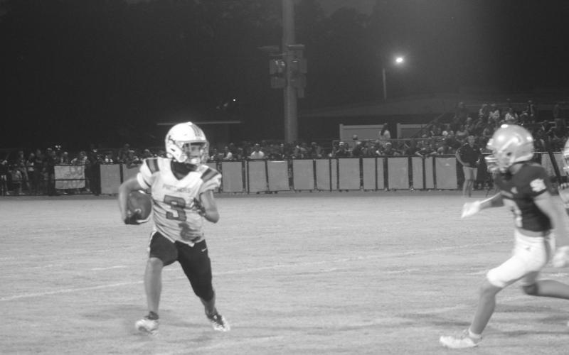 Pine Prairie’s Justin Narcisse (3) looks to find some running room in a loss against Sacred Heart. (Gazette photo by Tony Marks)