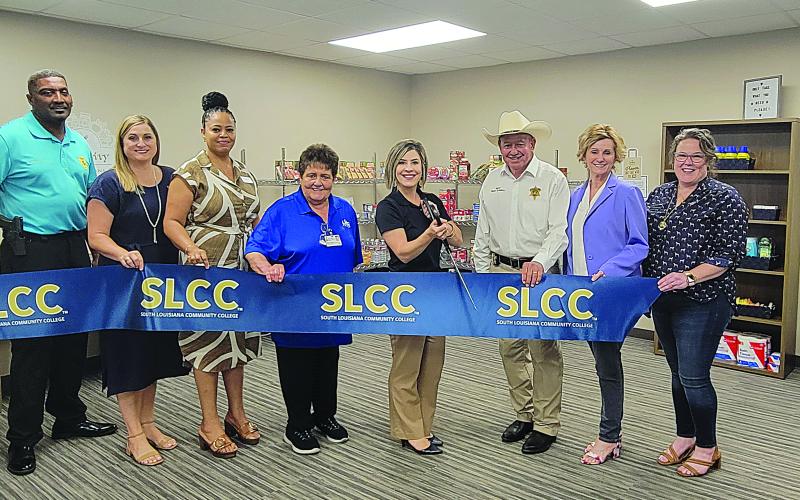 Pictured are Ville Platte Chief of Police Perry Thomas, Brittany Ducote (SLCC), Carleen Jones (SLCC), Mable Foreman (LHC Group), Lana Fontenot (SLCC), Evangeline Parish Sheriff Charles Guillory, State Representative Rhonda Butler (District 38), and Maggi Bienvenu (One Acadiana). (Photo courtesy of SLCC)