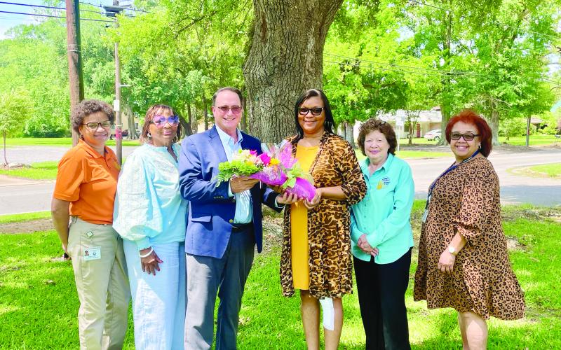 Pictured from left to right: Superintendent’s secretary Angelia Arvie, Teacher Quality Supervisor Grace Vidrine Sibley, Assistant Superintendent Mike Lombas, Honoree Pauline Toussaint, Title I Director Maryann Fontenot, and Support Personnel Coordinator Sherral Tezeno. (Photo by Tone Tezeno)
