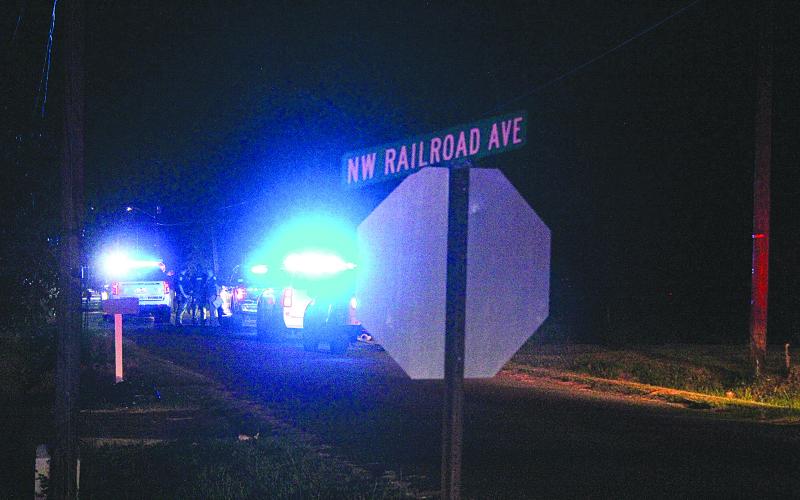 AUGUST 3 -  Pictured are law enforcement officers as they gather at the scene of Monday night’s shooting that claimed the life of Ville Platte Deputy Marshal Barry Giglio. Among the law enforcement agencies responding were Ville Platte Police Department, Ville Platte City Marshal’s Office, Evangeline Parish Sheriff’s Office, and Louisiana State Police.  (Gazette photos by Tony Marks)