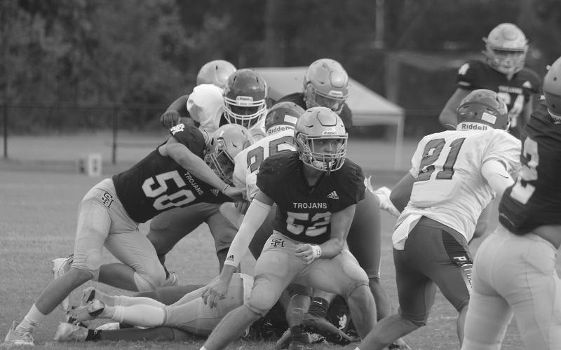 Campbell Earles (52) stares down a Bunkie rusher before making a tackle in Sacred Heart’s scrimmage against the Panthers. (Gazette photo by Tony Marks)