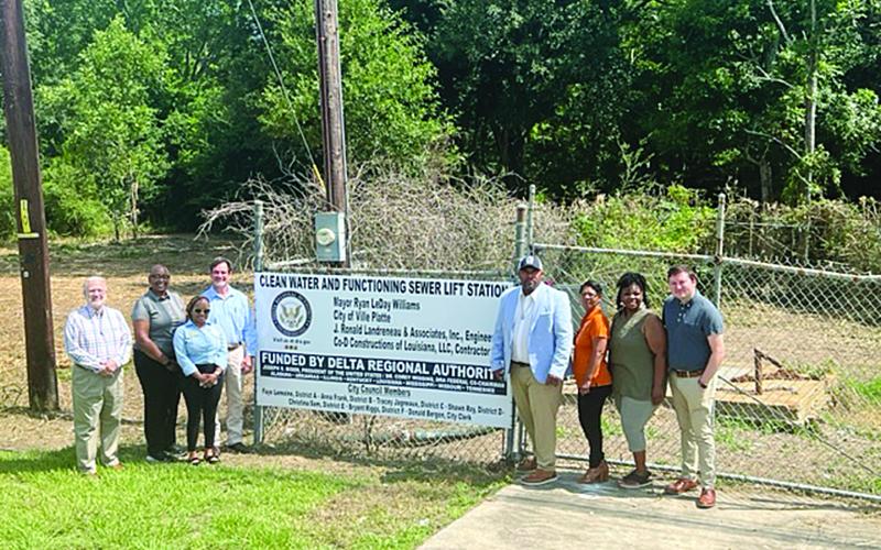 Pictured from left, at the site of the sewer lift station on West Main Street, are City Engineer Ronnie Landreneau, Christine Williams and Staresha Hoskins from Delta Regional Authority, City Clerk/ Treasurer Donald Bergeron, Mayor Ryan LeDay Williams, City Councilwomen Anna Frank and Christina Sam, and Kade Jones from Acadiana Planning Commission. (Gazette photo by Tony Marks)