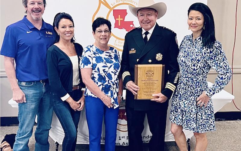 Pictured from left are Ben Marcantel, Hollie Guillory, Pam Guillory, Sheriff Charles Guillory, and Whitney Guillory. The sheriff is pictured with an award for being inducted into the Louisiana First Responders Christian Association Hall of Fame on Friday, October 25, in Lafayette. (Photo courtesy of Evangeline Parish Sheriff’s Office)