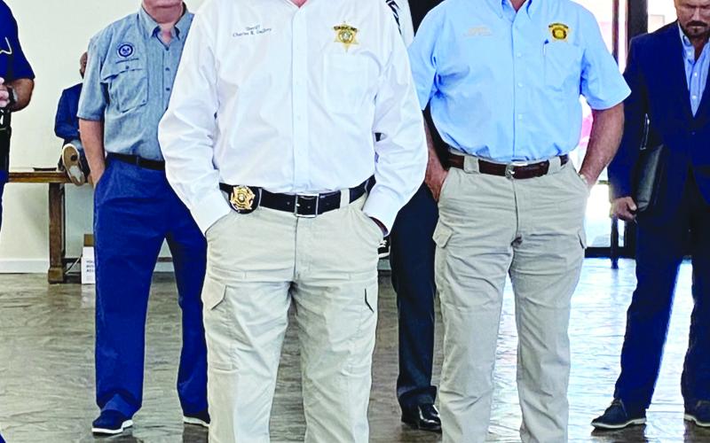 Evangeline Parish Sheriff Charles Guillory (center front) is pictured as he speaks during a crime response meeting at Ville Platte City Hall. Also pictured (from left) are Kyle Ardoin with the governor’s office, Secretary of Office of Juvenile Justice Kenneth Loftin, Rapides Parish Sheriff Mark Wood, and Larry Freeman with the attorney general’s office. (Photo by Misty Parker/ KVPI)