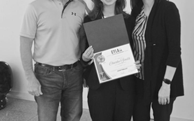 Charlee Smith (center) is shown with her parents Chris and Krystle Smith at the CYLA awards program in Baton Rouge.