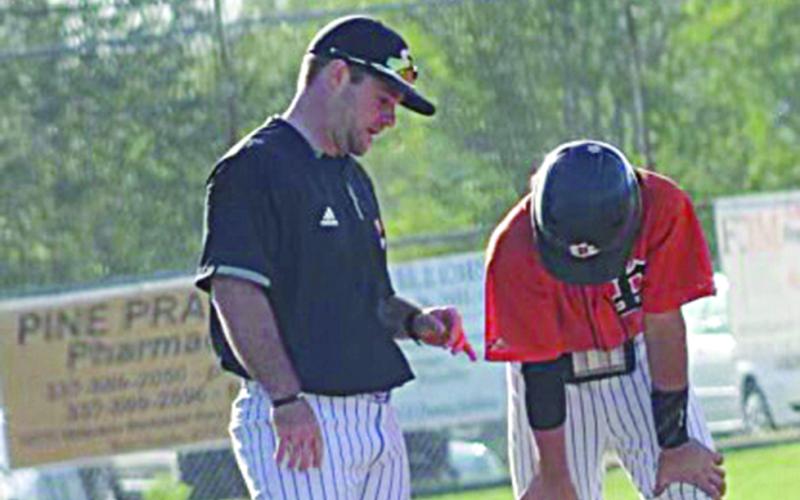 The 2022 Ville Platte Gazette’s Coach of the Year for baseball hails from Pine Prairie High School. Panther head coach Colton Chaddrick (left) led his team to another strong season in his first year as coach. (Photo submitted)