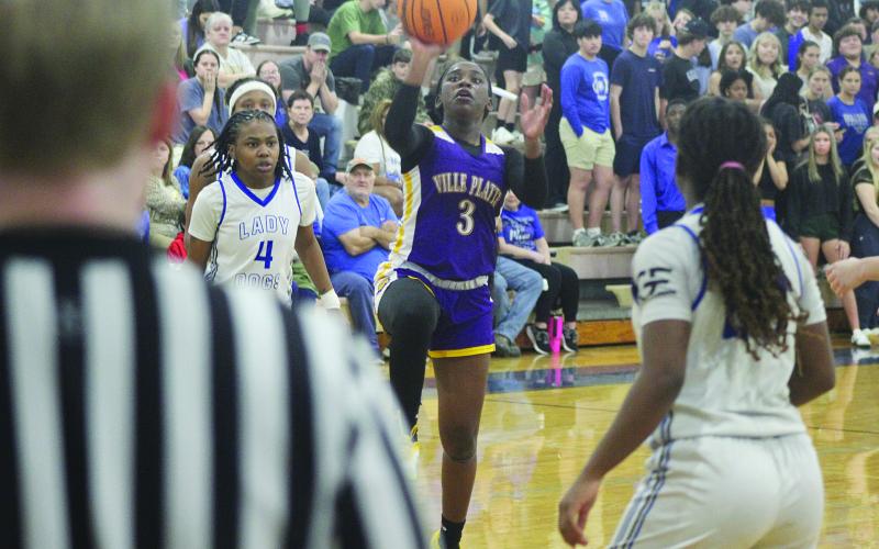 Yazminn Ardoin (3) gets off a basket in Ville Platte’s win over Springfield in the quarterfinals. The Lady Bulldogs then went on to fall 63-51 to French Settlement in the Division III Non-Select Semifinals in Hammond on Tuesday. (Gazette photo by Tony Marks)