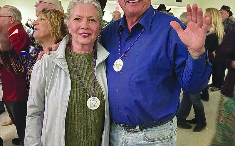 In the right photo is Judge Jimmy Genovese (right). Judge Genovese served as a district judge in St. Landry Parish before serving on the Third Circuit Court of Appeal and the Louisiana Supreme Court. He is now president of Northwestern State University and is pictured with his wife, Barbara. (Gazette photos by Tony Marks)