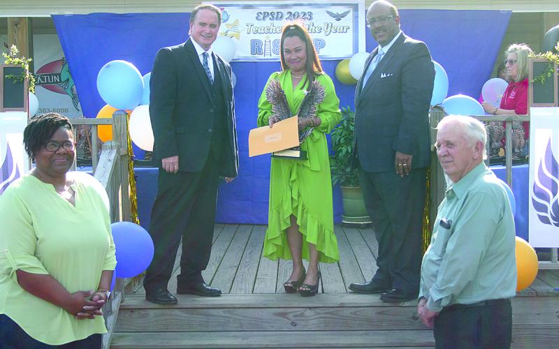 From left are Asst. Supt. Mike Lombas, High School Teacher of the Year Emee Aswell from Ville Platte High and Supt. Darwan Lazard. Aswell is a state semifinalist for teacher of the year. (Gazette photo by Tony Marks)