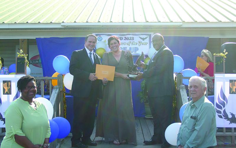 From left are Asst. Supt. Lombas, Middle School Teacher of the Year Misti Fontenot from Mamou High School and Supt. Lazard. (Gazette photo by Tony Marks)