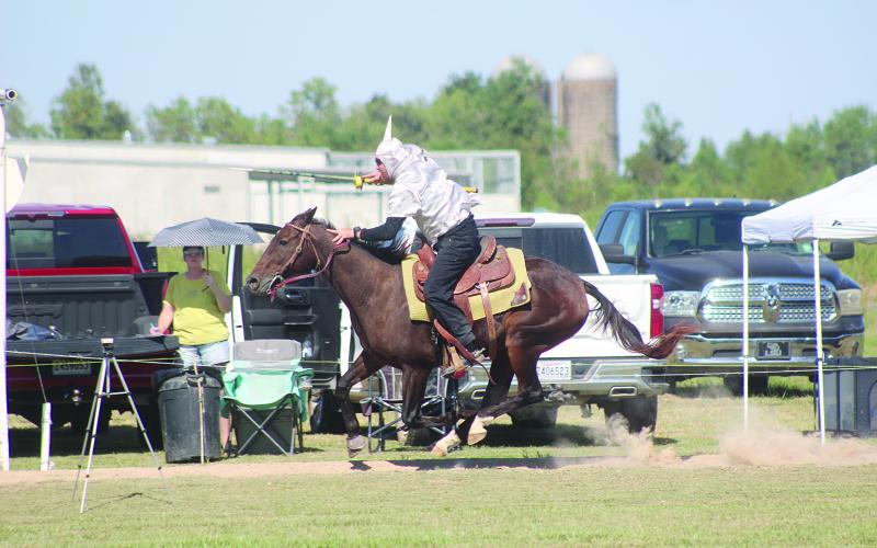 Brandon Snoke  is pictured as he rides Charlie during the first of three rounds of the Louisiana Tournoi on Sunday, October 12, at the Industrial Park. After all rounds, Snoke emerged as the champion for the first time. (Gazette photo by Tony Marks)