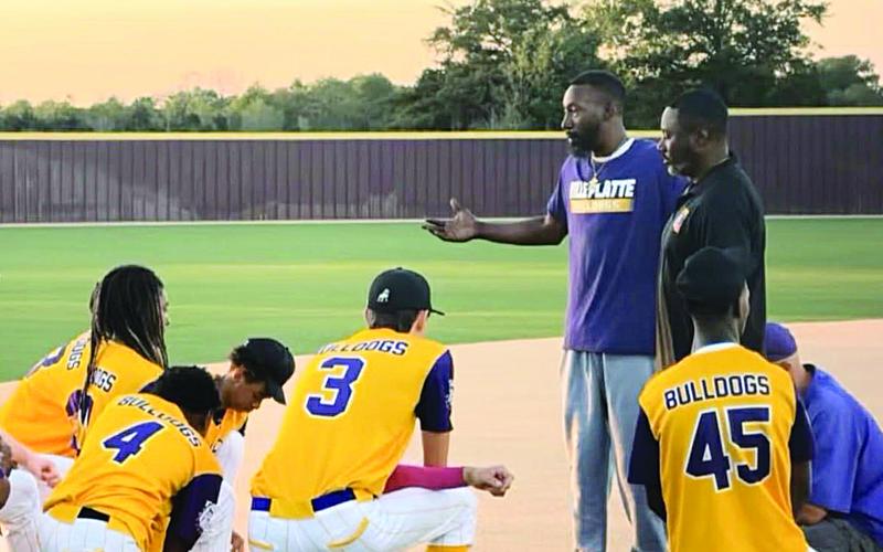 Trumaine Johnson (center) is pictured during a Ville Platte High baseball  game this season. He spent the past season as the team’s head coach. (Photo courtesy of Trumaine Johnson)