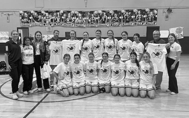 The Sacred Heart Lady Trojans finished as runner-up in the annual Turkey Tournament. Pictured are Head Coach Craig Whittington, Assistant Coach Shane Darbonne, Manager Caroline Richardson, Videographer Layla McElwee, Statisticians Emily Ardoin and Jenna Manuel, and players Taylor Darbonne, Kali Shiver, Jodie Landry, Ava Johnson, Rose Ardoin, Jolie Vidrine, Olivia Tate, Laura Prudhomme, Breanne Ardoin,  Averie Pitre, Mary Perron, Alyssa Brignac, and Josie Vidrine.  (LSN photo by Tony Marks)