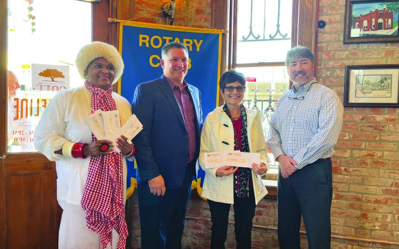 VP ROTARY WELCOMES STATE TREASURER - Louisiana State Treasurer John Schroder, second from left, was the special guest speaker for the December 21, meeting of the Ville Platte Rotary Club. He is shown with, from left, Ville Platte Mayor and Rotarian Jennifer Vidrine, Rotarian Annette Johnson and Rotary President Jimmy LeBlanc. (Gazette photo by Heather Bogard)