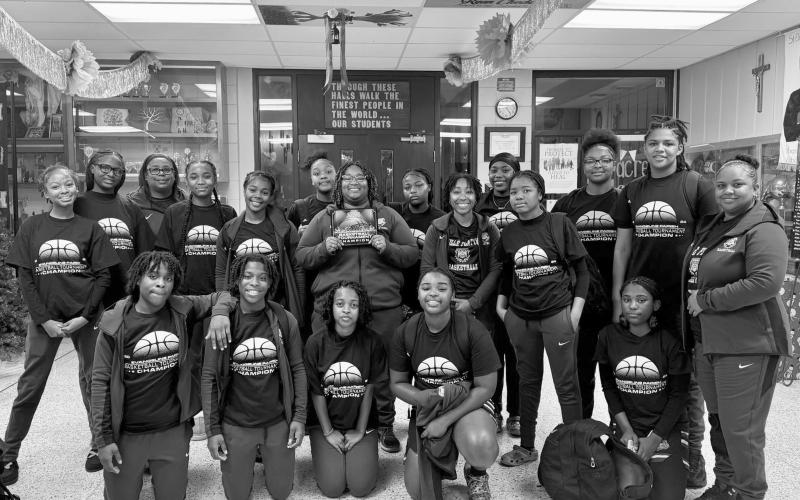 In the left photo is the girls’ team which includes players Britelah Freeman, Yazmin Ardoin, Janiah Leday, Marlei Doucet, Aniyah James, Keanna Castille, Danasha Jack, Leah Clark, Cassie West, Brileyah Freeman, Raeosha Thomas, Toni Falkenberry, Kaitlyn Ferguson, Kadrionna Lewis, and Chauncey Tezeno.