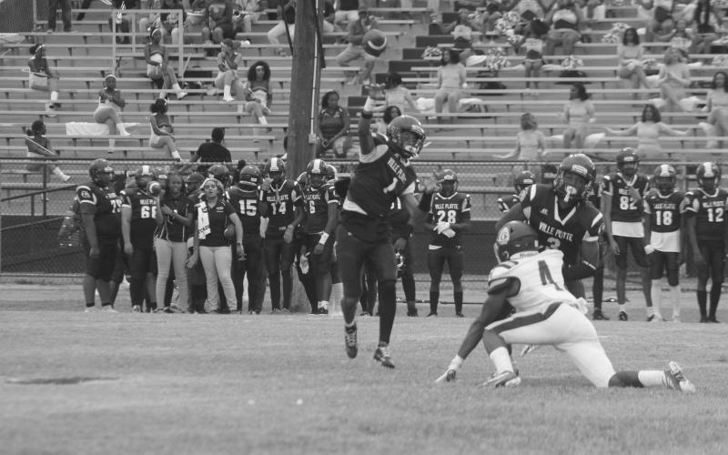Latelldrick Prejean (3) blocks Oakdale’s Charles Shird (4) to allow Jaquan Lavergne (1) enough time to deliver a pass in Ville Platte’s Week 3 loss, 35-20. The Bulldogs now travel to Iota to begin district play.  (LSN photo by Tony Marks)