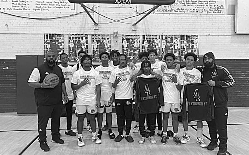 The Ville Platte High School Bulldogs again won the Evangeline Parish Tournament. Members of the team are head coach Launey Coward and Latravion Thomas, Jaquan Lavergne, Latelldrick Prejean, Jaden Jacobs, Sage Papillion, Damgrien Doucet, Jarien Leday, Jammanry Thomas, Chavez Tezers, Tavion Thomas, Jakia Thomas, and Jakylin Manley. (Photo courtesy of Ville Platte High School)