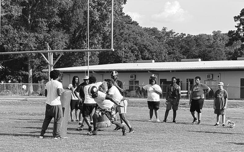 Several members of the Ville Platte High football team participate in drills on Wednesday, July 16. (Gazette photo by Tony Marks)