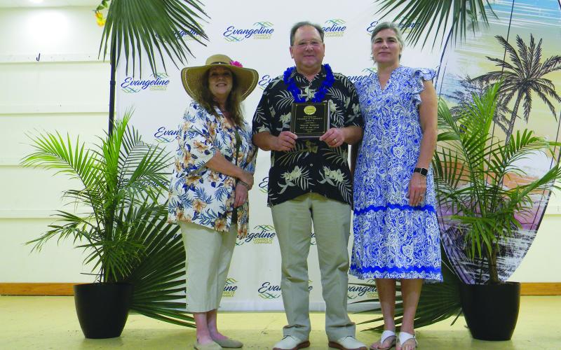 MAN OF THE YEAR - Wayne Vidrine with Evangeline Bank and Trust Company was named Man of the Year. He is shown with Connie Lamke (left) and Angela Fontenot (right). (Gazette photos by Heather Bogard)