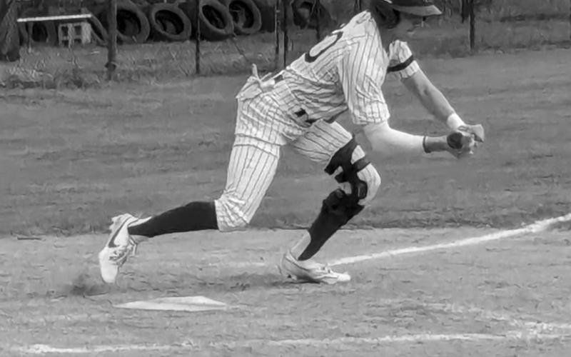 Landon LeBlanc (20) attempts to lay down a bunt. (Gazette photo by Rhett Manuel)