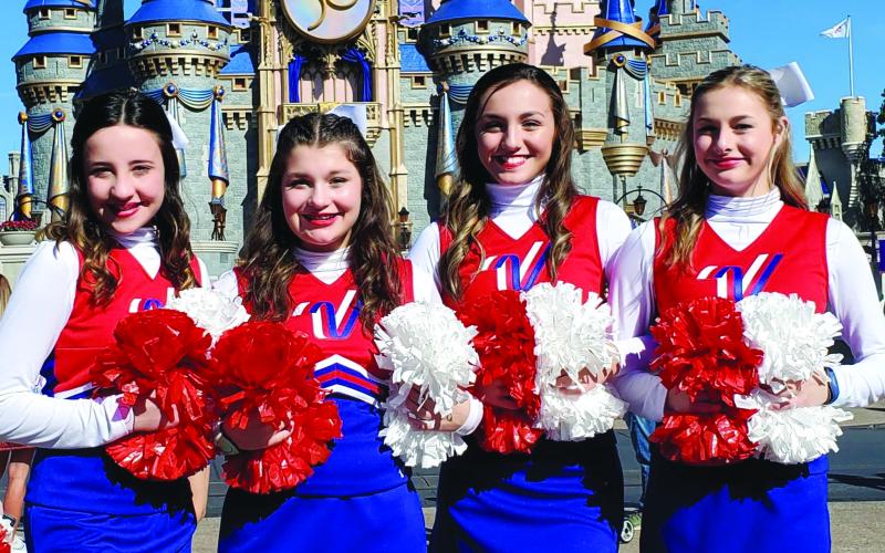 BCE CHEERLEADERS PERFORM AT DISNEY WORLD - From left, Bayou Chicot Elementary cheerleaders Madison Harrington, Carlie Vidrine, Payton Estilette and Brooklyn White pose in front of Cinderella’s Castle at Magic Kingdom in Walt Disney World. (Photo courtesy of Jaimi Vidrine)