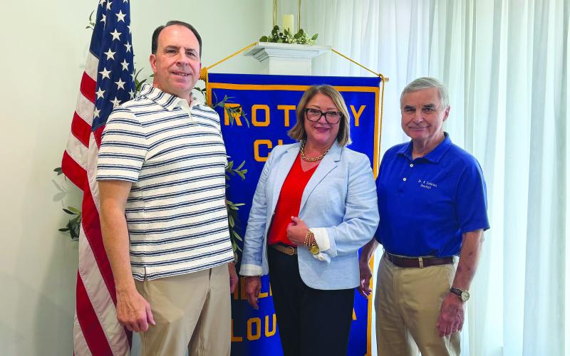 SUPERINTENDENT PREPARES FOR NEW ROLE - From left, are Rotarian Darin Bordelon, Evangeline Parish School District Superintendent Cheri Fontenot, and Rotary President Dr. Kirk Soileau at the July 7, meeting of the Ville Platte Rotary Club. (Gazette photo by Heather Bogard)