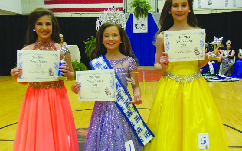 DEB MISS COURT - Shown, from left, are the members of the Deb Miss Boggy Bayou Court. They are Emma Nicole Andrus, first alternate; Queen Meredith Deaton; and Aurora Grace McKenzie Tamez, second alternate.