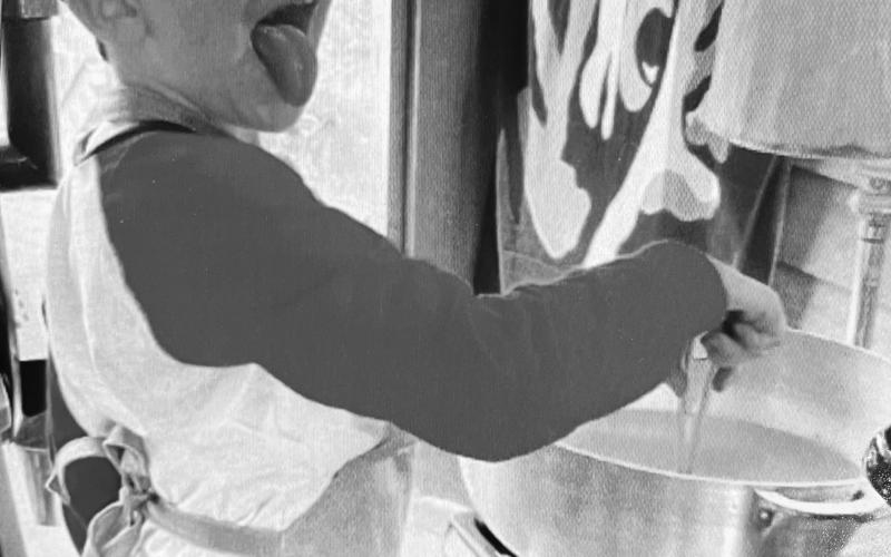 Jean Travis, 6 years old, of Bayou Chicot, makes bread and butter pickles. (Photo courtesy of EPAR)