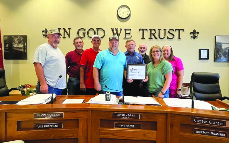 EPPJ RECEIVES BROADBAND INITIATIVE AWARD - During a special meeting held Wednesday, August 16, the Evangeline Parish Police Jury received a broadband initiative award. Shown, from left, are jurors Keith Saucier, Ryan Ardoin, vice president Kevin Veillon, president Bryan Vidrine, secretary-treasurer Chester Granger, and jurors Eric Soileau, Leila Thrasher and Angelica Williams. (Gazette photo by Heather Bogard)